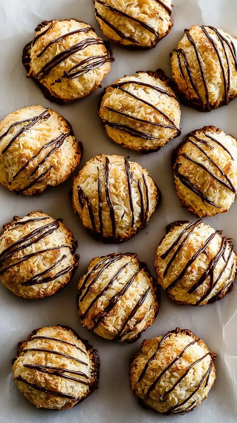 Golden brown coconut macaroons on a cooling rack
