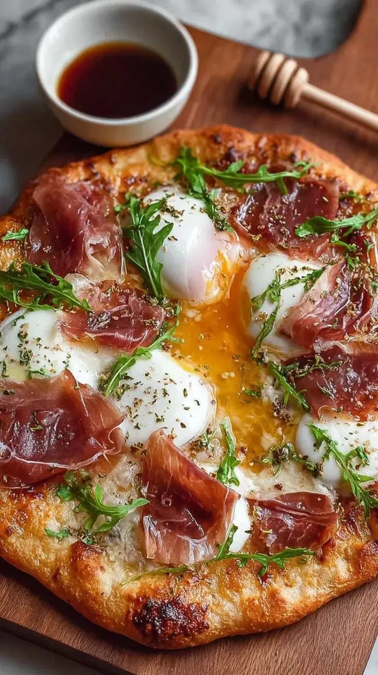 Artisanal high protein pizza topped with fresh burrata, prosciutto, and green arugula on a wooden board.